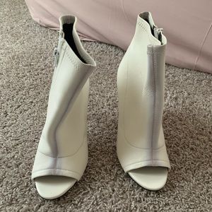 White heeled booties